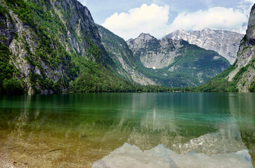 Lake with the color of clear green water at Obersee lake in the Nationalpark Berchtesgaden, Bavaria, Germany.