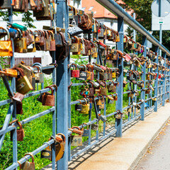 Display of love on a bridge in Gliwice, Poland. Padlocks in all colours are inscribed and locked...
