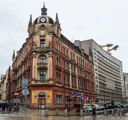 Apartment building in Katowice, Poland. Built in 1901 in a highly ornamented style. A few decades later came the Bauhaus style (gray building).