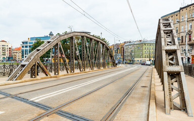 Mlynski most (Mill bridge) in Wrocław, Poland, is a unique polygonal steel bridge across the Oder...