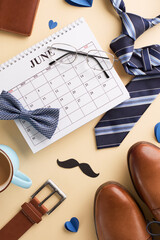 Father's Day countdown setup featuring a June calendar surrounded by men's fashion accessories,...