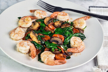 shrimp with  sauteed spinach, mushrooms and  tomatoes - Powered by Adobe