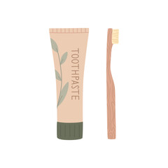 Bamboo toothbrush and natural toothpaste, isolated on white background.