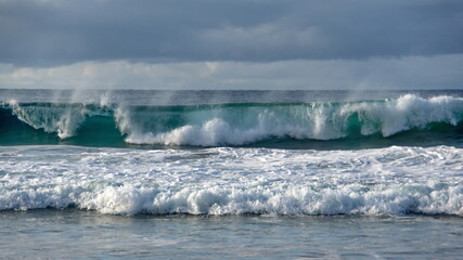 Waves breaking off the beach in Zipolite, Mexico