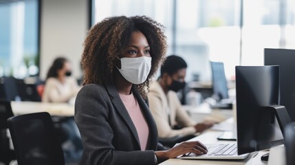 Mixed-race call center telemarketing agent wearing face mask for safety and using headset and computer in workplace. Female consultant on covid pandemic helpdesk for customer service and sales.