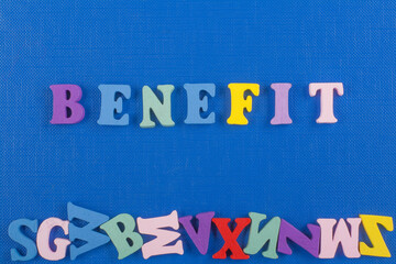BENEFIT word on blue background composed from colorful abc alphabet block wooden letters, copy space for ad text. Learning english concept.