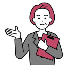 クリップボードを持って説明する年配のスーツの女性