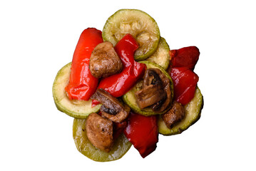 Delicious fresh grilled vegetables zucchini, bell peppers, mushrooms and onions