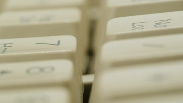 Old vintage keyboard retro pc close-up , Old computer studio close-up, Desktop vintage retro wave display, late 90s PC.
