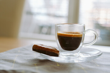 cup of espresso coffee with chocolate gingerbread