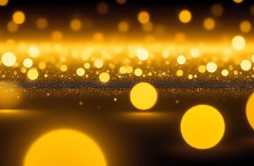 gold sparkles on a black background. Abstract background.