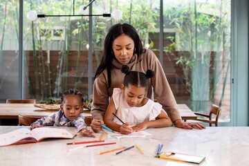 Mother homeschooling kids during the pandemic
