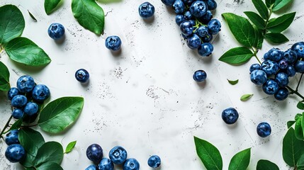 Fresh blueberries scattered with leaves on a white textured background, ideal for food and nutrition themes.