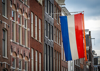 Dutch flag with orange pennant for Kingsday and liberation day celebrations in The Netherlands