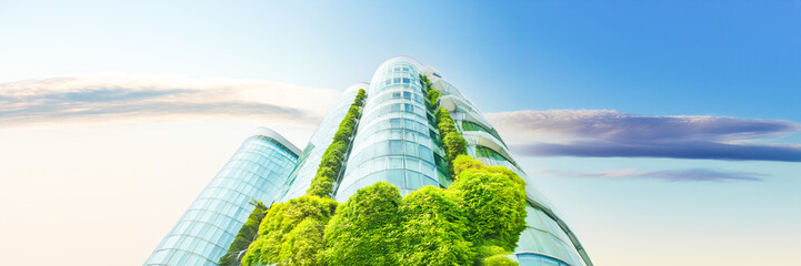 Obraz premium green tower with glass and vegetal plants facade perspective