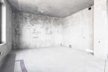 interior of the apartment without decoration in gray colors. rough finish