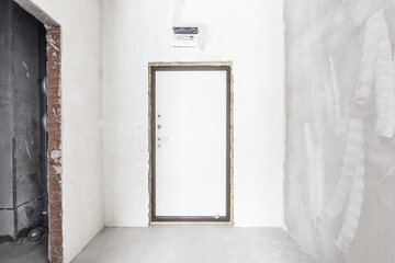 interior of the apartment without decoration in gray colors. rough finish