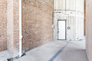 interior of the apartment without decoration in gray colors. rough finish