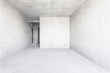 interior of the apartment without decoration in gray colors. rough finish