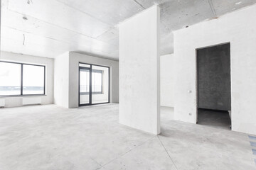 interior of the apartment without decoration in gray colors. rough finish