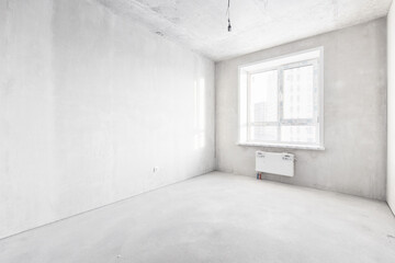 interior of the apartment without decoration in gray colors. rough finish