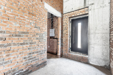 interior of the apartment without decoration in gray colors. rough finish