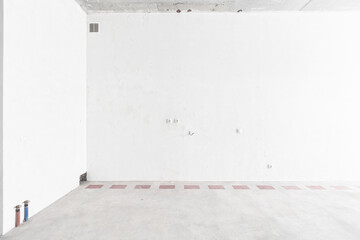 interior of the apartment without decoration in gray colors. rough finish