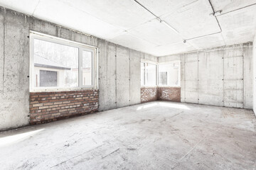 interior of the apartment without decoration in gray colors. rough finish
