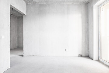 interior of the apartment without decoration in gray colors. rough finish