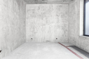 interior of the apartment without decoration in gray colors. rough finish