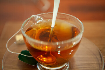 A cup of red tea on the table