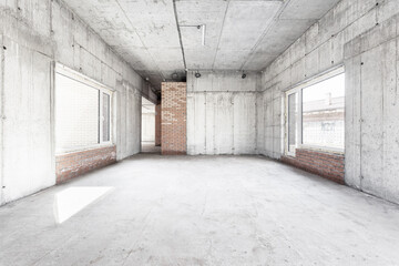 interior of the apartment without decoration in gray colors. rough finish