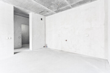 interior of the apartment without decoration in gray colors. rough finish