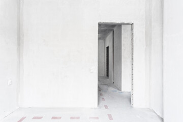 interior of the apartment without decoration in gray colors. rough finish