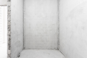 interior of the apartment without decoration in gray colors. rough finish