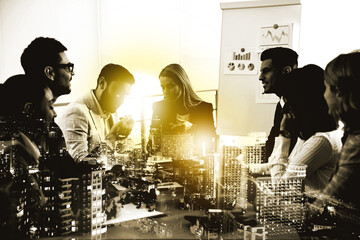 Double exposure of successful business team and cityscape