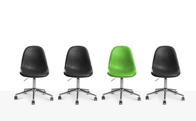 Vacant position. Green office chair among black ones on white background