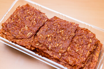 Close up sliced sheets of dried sweet pork