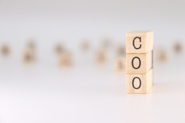 COO Acronym. Concept of Chief Operating Officer written on wooden cubes isolated on white background