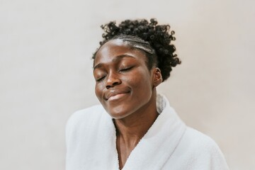 Obraz premium African American woman in bathrobe