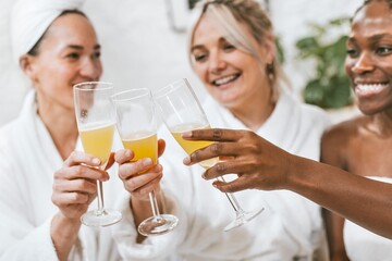 Friends in spa salon drinking, self-care photography