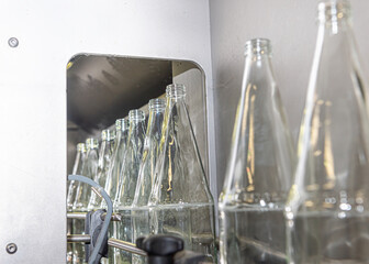 Prior to being filled, glass beverage bottles undergo a thorough cleaning process in a dedicated...