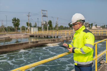 Environmental engineers work at wastewater treatment plants,Water supply engineering working at...