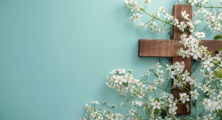 Wooden cross with white flowers on a blue background, in the style of copy space concept for Easter and Bible study designs. Flat lay decoration of a wooden Christian symbol with spring blossoms - Powered by Adobe