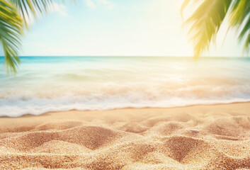 Beautiful defocused natural background for summer holidays and travel. Golden sand of a tropical beach, blurred palm leaves on a sunny day.