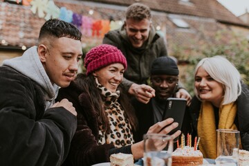 Man meaning of examining a friend group selfie