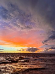 Sunset sky. Nature beautiful Light Sunset or sunrise over sea,Colorful dramatic majestic scenery sunset Sky with Amazing clouds and waves in sunset sky purple light cloud background. Bali. ocean