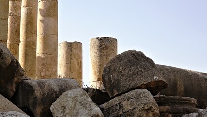 stone columns of archaeological remains against the sky