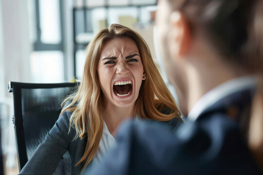 Out of control boss shouting to a stressed employee. Hostile boss and mobbing concept