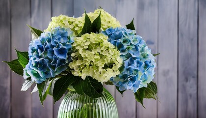 bouquet of blue and green flowers in a vase